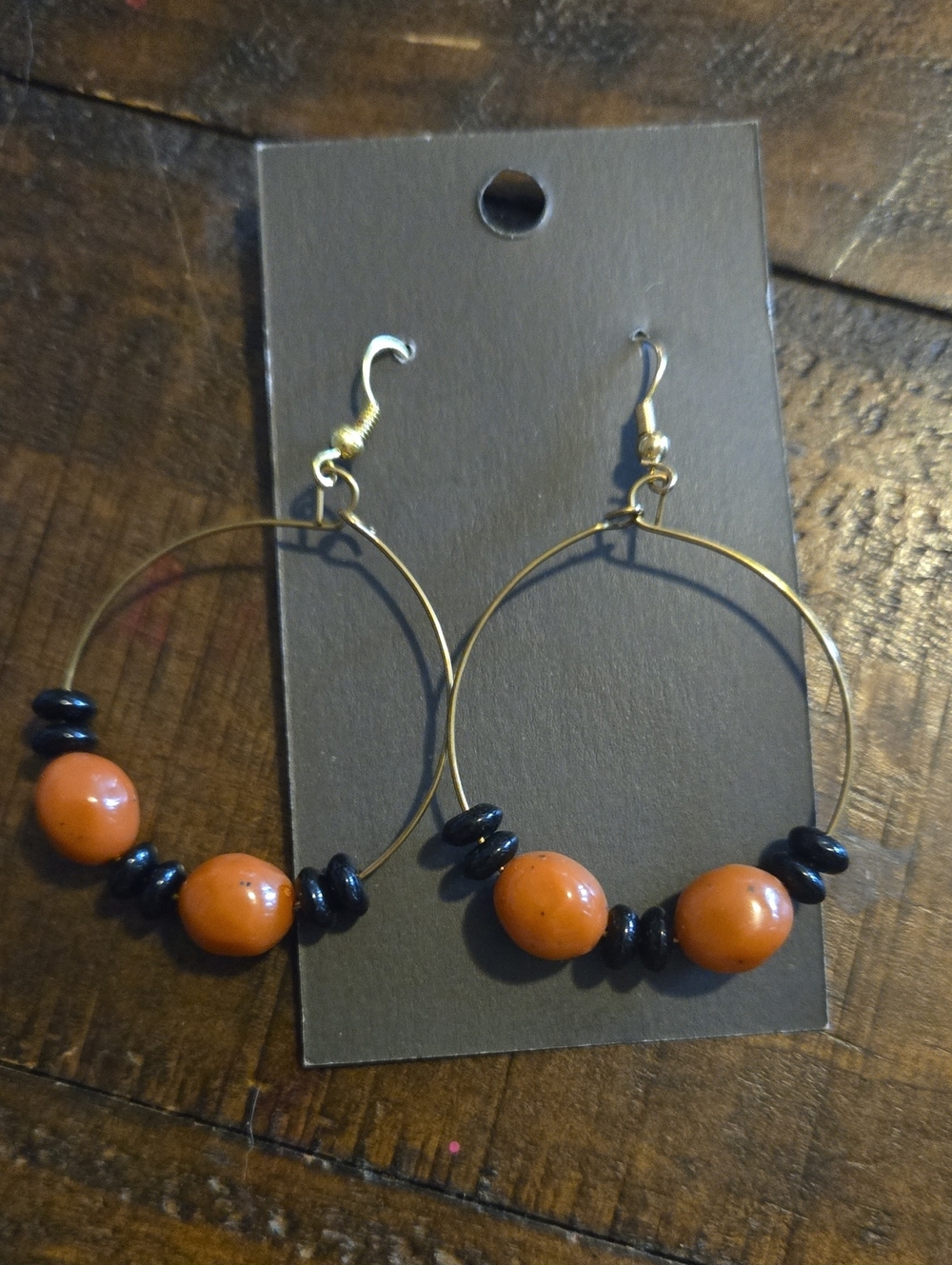 Gold Hoop Earrings with Orange and Black Beads